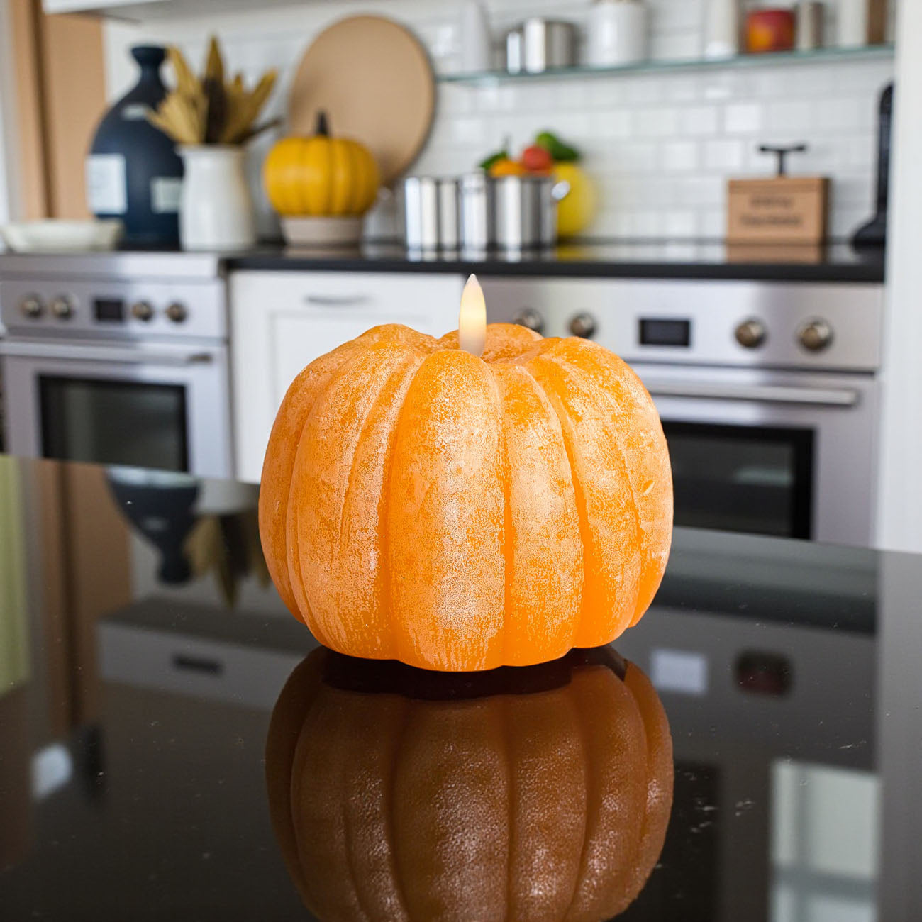 pumpkin and gourd LED table centerpiece
cozy fall home decor without flame
harvest pumpkin LED candle decorations